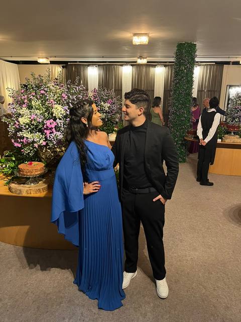 Sara e João em um evento